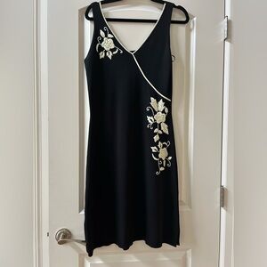 Vertigo Paris embroidered v neck midi length dress. Knit stretch fabric. EUC. M